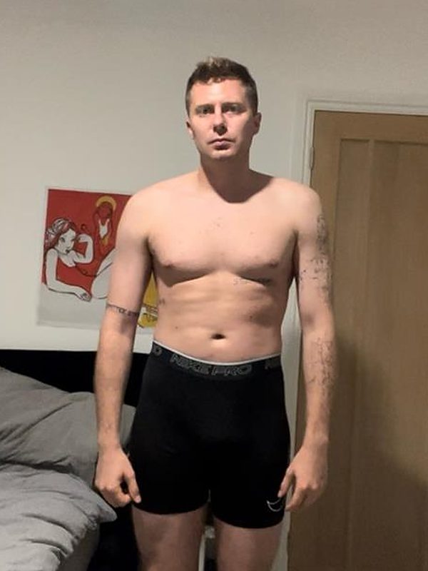 Ben before coaching, standing in his bedroom.